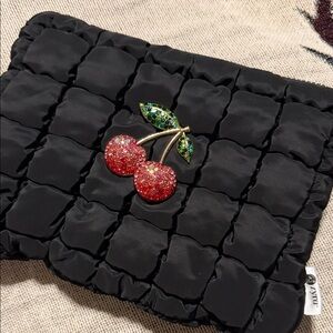 Black Quilted Clutch with Cherry Brooch